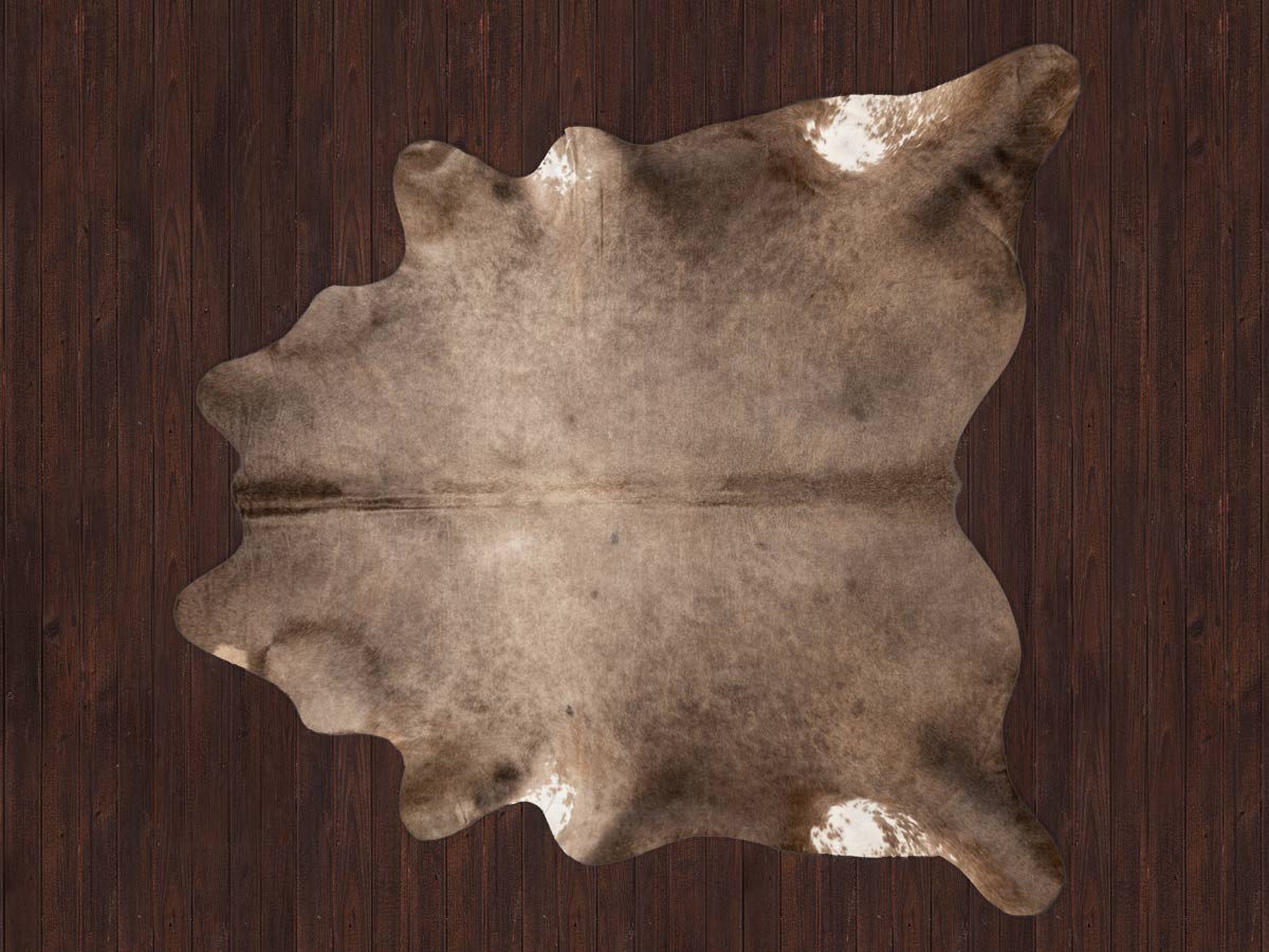 Rare natural bronze cowhide rug