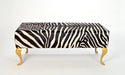 Zebra ottoman with gold legs