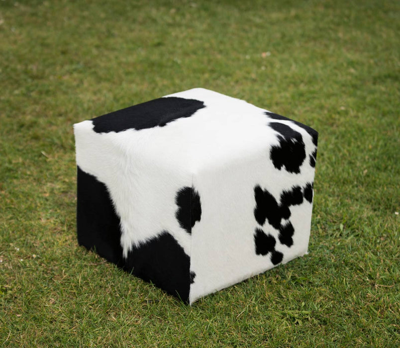 Black and white cowhide cube stool