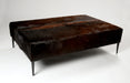 Dark cowhide ottoman black metal legs