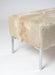 White cowhide bench ottoman