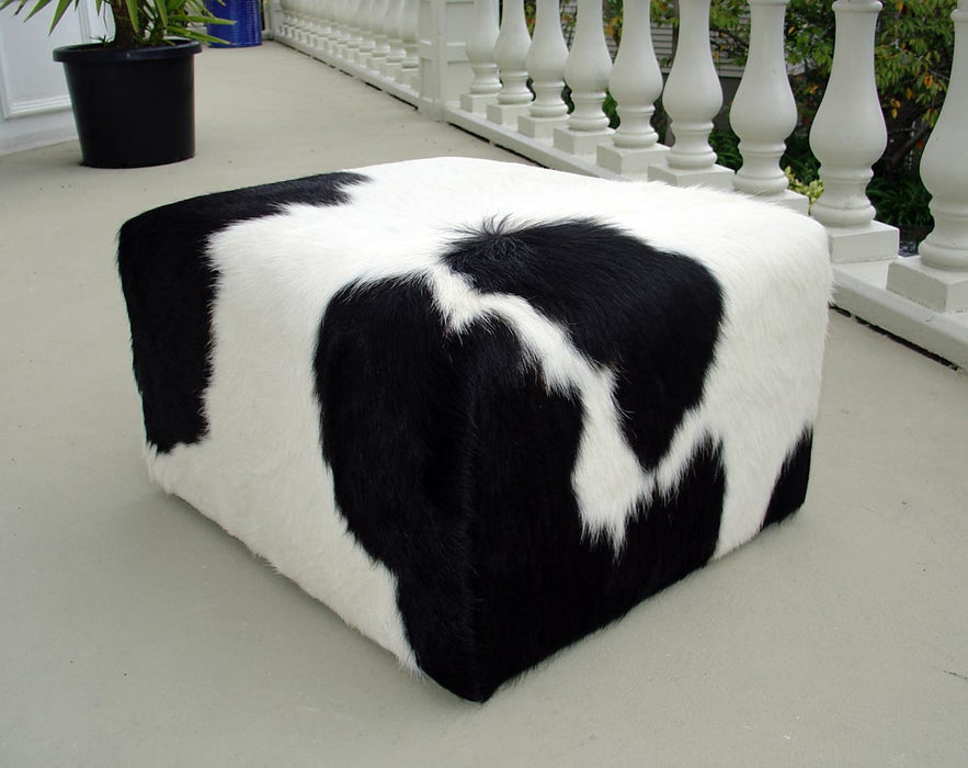 Cube ottoman footstool black and white cowhide