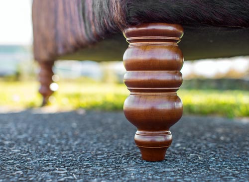 Turned wood ottoman legs