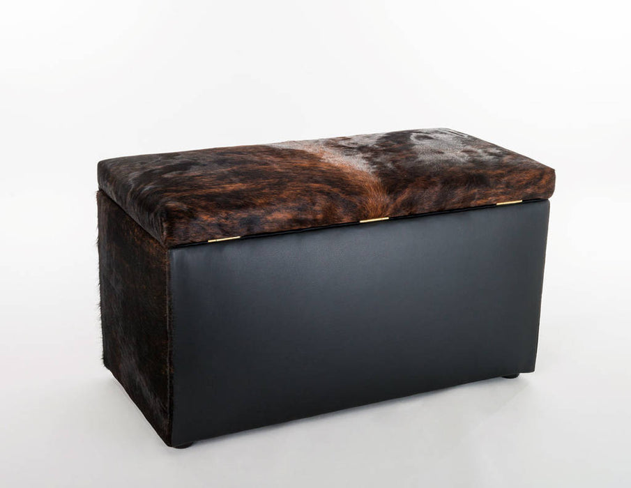 Storage ottoman in cowhide by Gorgeous Creatures